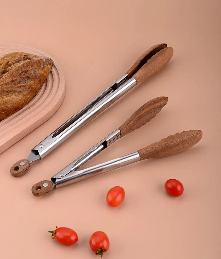 Hot Sale Stainless Steel Walnut Olive Wooden Kitchen BBQ Spaghetti Meat Garlic Clip Fry Food Tongs With Wood Lock manufacture