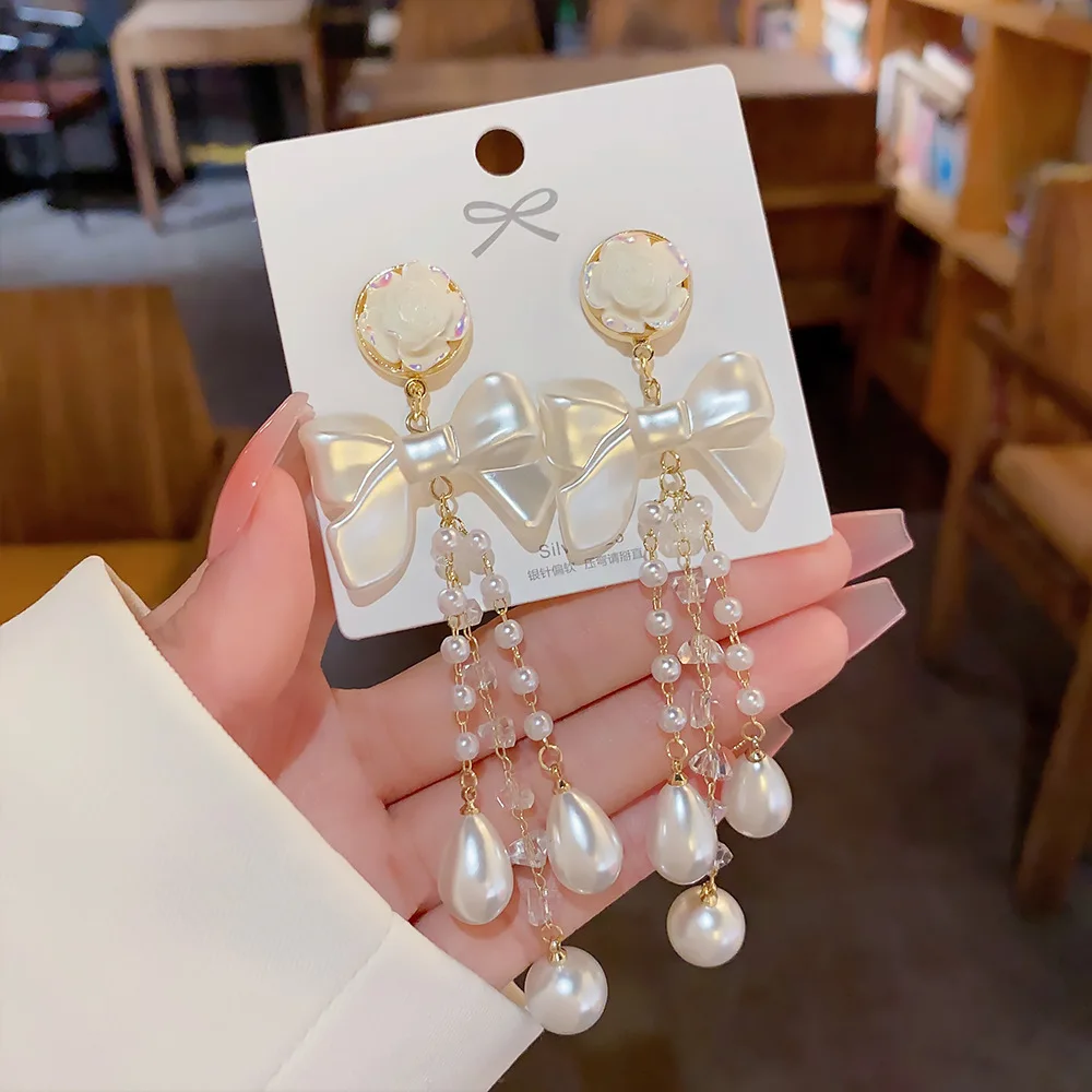 韓国人気【MONDAY EDITION】Pearl Bow Earrings☆追跡付 TIE THE RIBBON - MONDAY EDITION