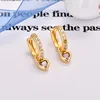 Gold-plated pink stone earrings.