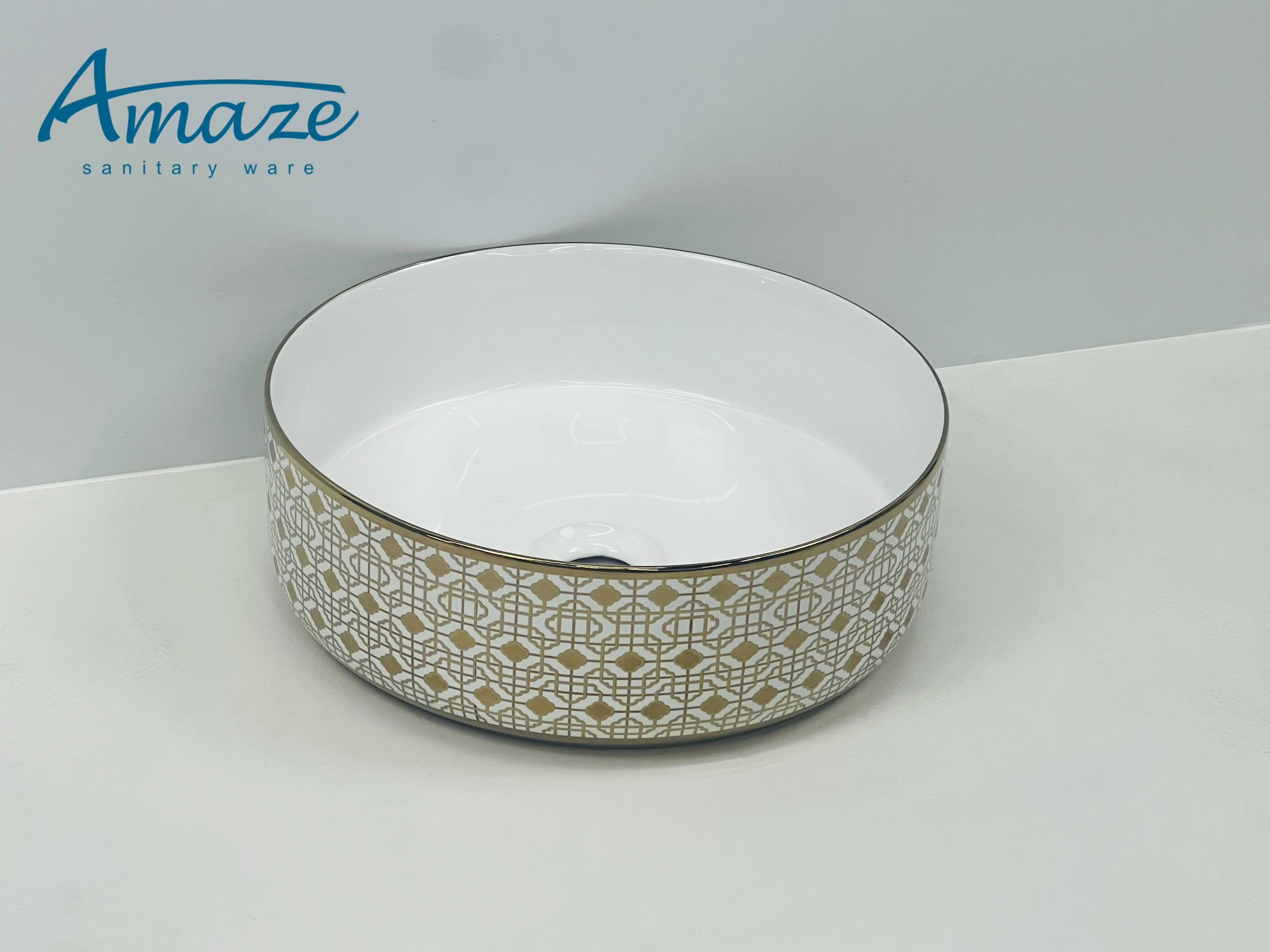 China high quality sanitary ware gold plating pattern ceramic counter top wash basin easy to clean bathroom face basin art basin supplier