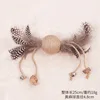 Plumes de paon boisées
