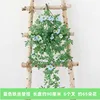 Colgante de pared con margaritas azul claro