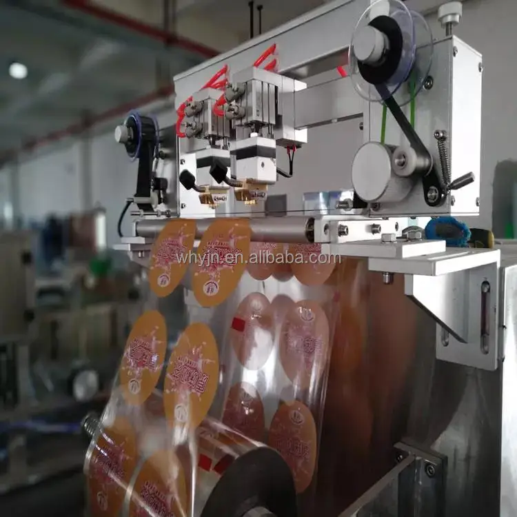 Automatic Butter Milk Lassi Packing Jelly Cup Filling and Sealing Machine