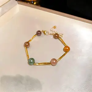 Colorful Pearl Bracelet with Gold Plated Links Adjustable Chain Elegant Handmade Jewelry for Women Ideal for Party Daily Wear
