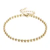 Bracciale con perline rotonde dorate