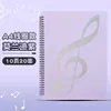 สมุดโน้ตสีม่วงแบบ 2 หน้า พร้อมสันเกลียว รองรับแผ่นโน้ตเพลงได้ 20 แผ่น