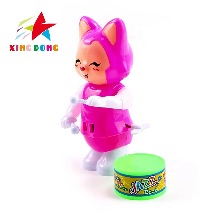 Wholesale custom wind up toys cute mini cartoon boy beat a drum