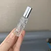 Transparent bottle with silver lid