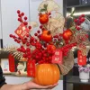Orange pumpkin, red fruit, golden pomegranate