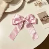 Pink polka dot bow hair clip