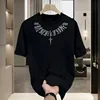 Black letter cross neckline
