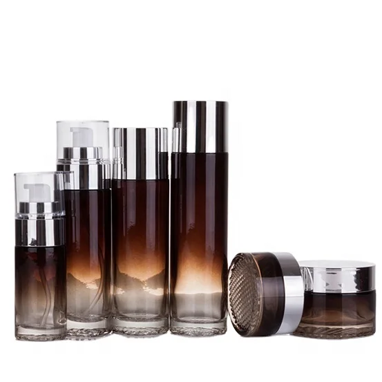 Luxury Cosmetic glass bottle set -- skincare container manufacturer-- new style design with pump&spray&gold/aluminum cap