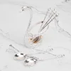 Feather swan silver spoon