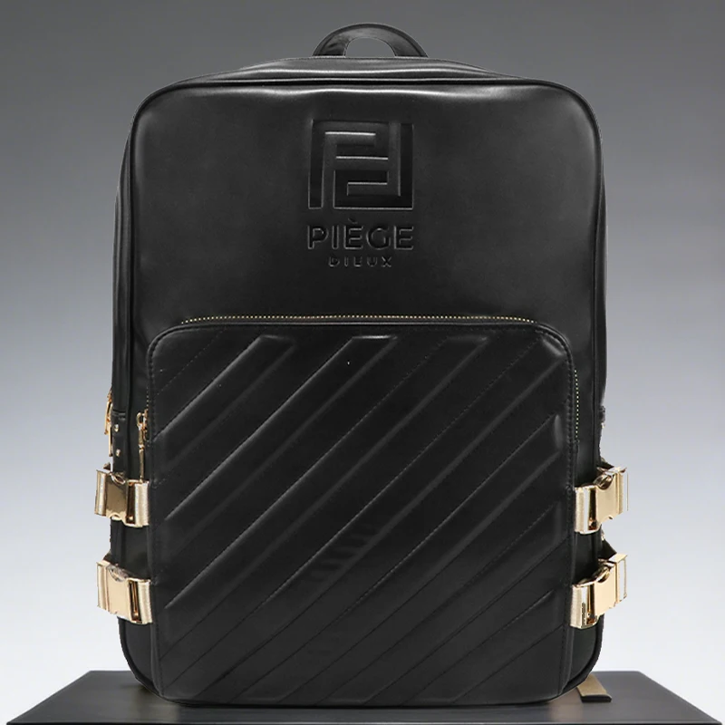 designer black leather backpack silver zippers Grained ~ GIANI shaped zip opens to a roomy interior with a padded laptop sleeve and thoughtfully placed compartments for tech Ever noticed how the right