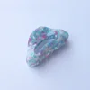 Confettis bleus roses marbrés