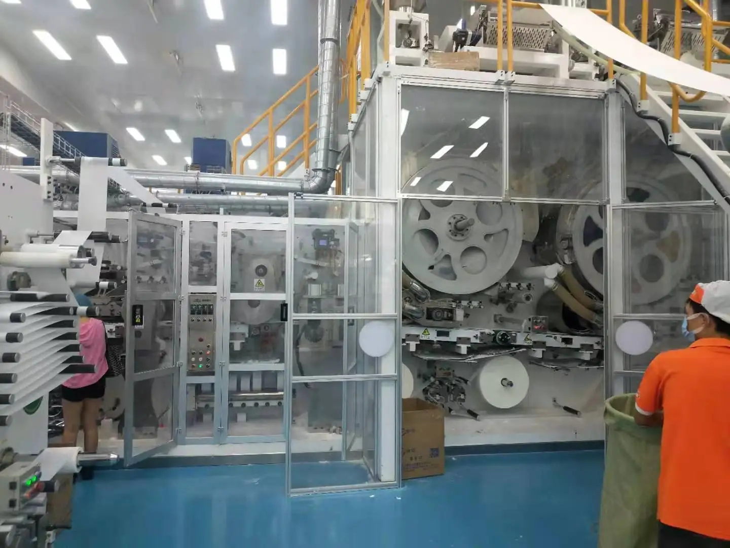 WellDone New Condition Semi-Servo Laminating Adult Urine Pants Production Machine Good Supplier Adult Diaper Making Machine