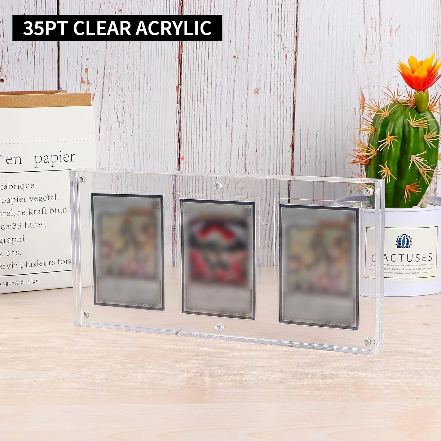 1 แพ็ค กรอบใส่การ์ด TCG อะคริลิก 35PT แบบ 3 ช่อง เปิดปิดง่ายด้วยปุ่มเดียว ขาตั้งโชว์การ์ดใส หนา 20 มม.