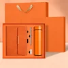 Orange notebook pen USB flash drive insulated cup