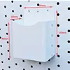 Caja de almacenamiento cuadrada blanca.