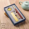 Juego de 3 piezas Gengdu: bolígrafo kotan, marcapáginas, hebilla para libros, caja de regalo y libreta.