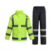 Green jacket and black pants