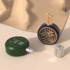 Frasco de perfume verde
