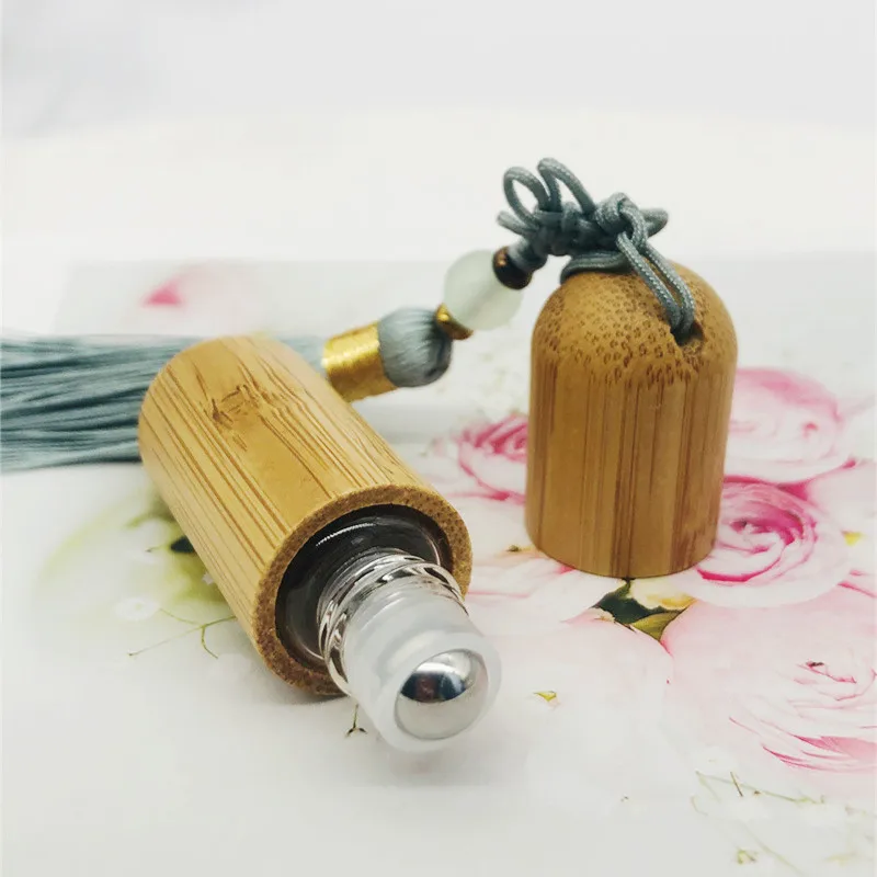 New Style 1ml 2ml 3ml 5ml Cute Refillable Bamboo Roller Bottle Essential Oil with Steel Roller Ball and Tassels