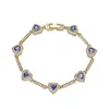 Bracciale con diamanti blu dorati