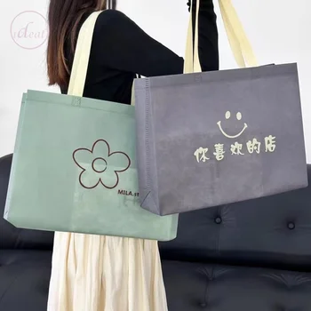 Fashion design top quality eco-friendly cloth non woven bag cheap wholesale price gift paper bag shopping