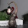 Brass-effect elephant lantern