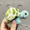 Plush turtle - silver chain with dots and green body