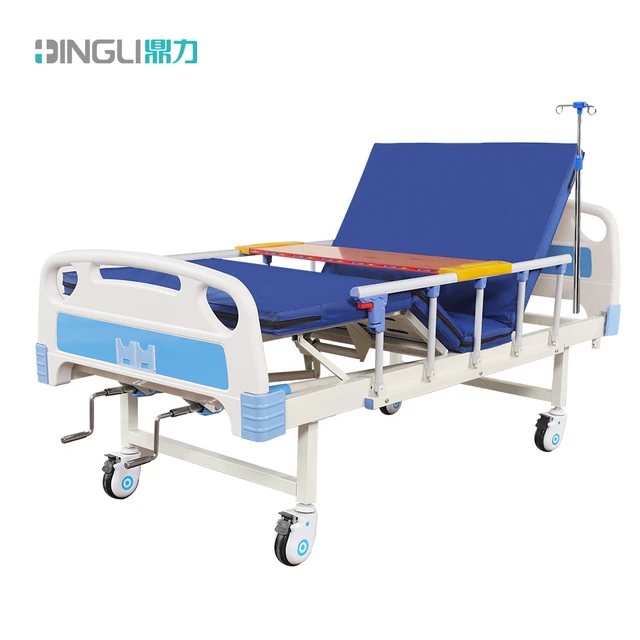 Two Crank Comfortable Manual Medical hospital Bed with ABS Bed End and Wooden Dining Table for Home care Sale