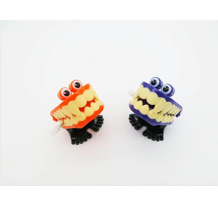 Hot Sale Wind up Jumping Ghost Teeth ABS