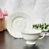 Taza de café y platillo