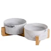 Gray ceramics double bowl with wooden frame