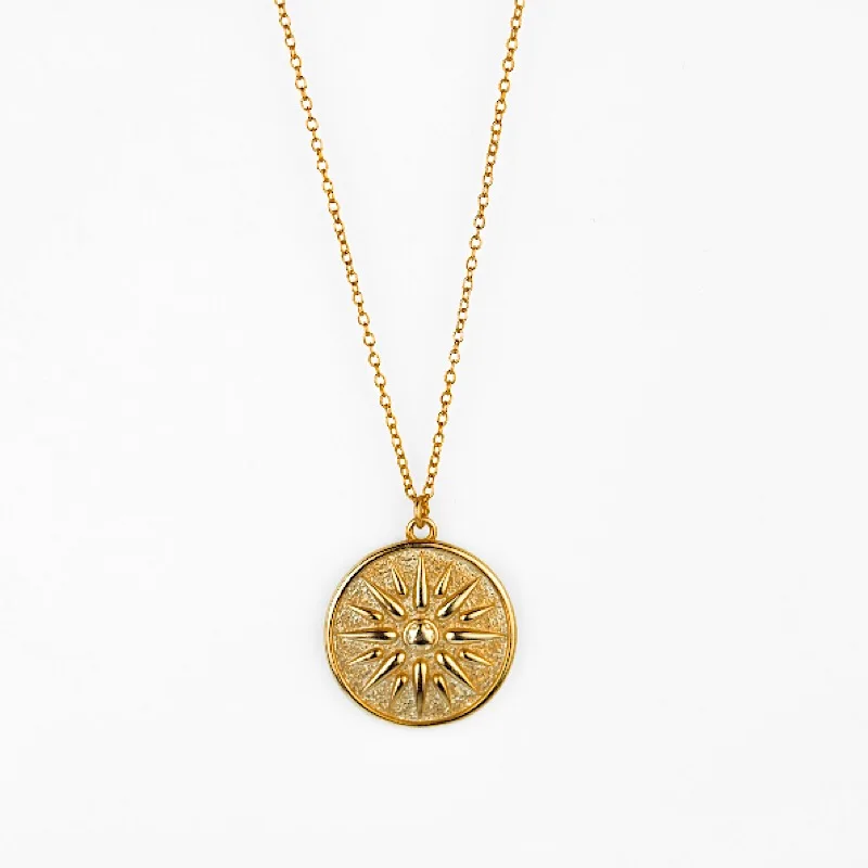 gold sun medallion