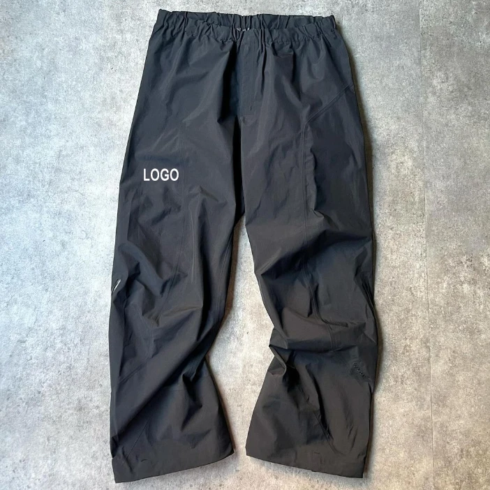 OEM Custom High Quality Man Black Loose Oversize Zipper Open Bottom Baggy Nylon Polyester Track Pants for Men details