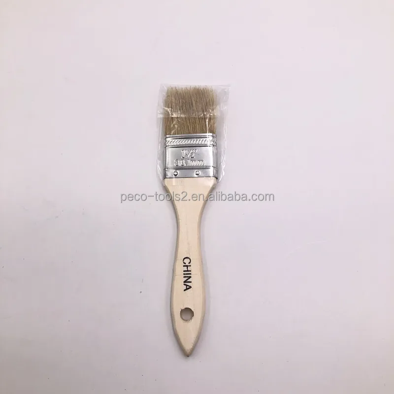 Artist Cleaning Flat Paint Brush