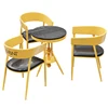 One table and three chairs