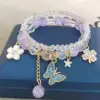 Purple butterfly-diamond accents