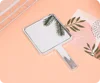 silver square handle mirror