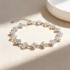 Bracciale color argento con diamanti bianchi