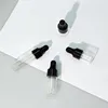 clear dropper bottle + black ring + black cap