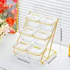 6-sided striped transparent gold staircase with gold support