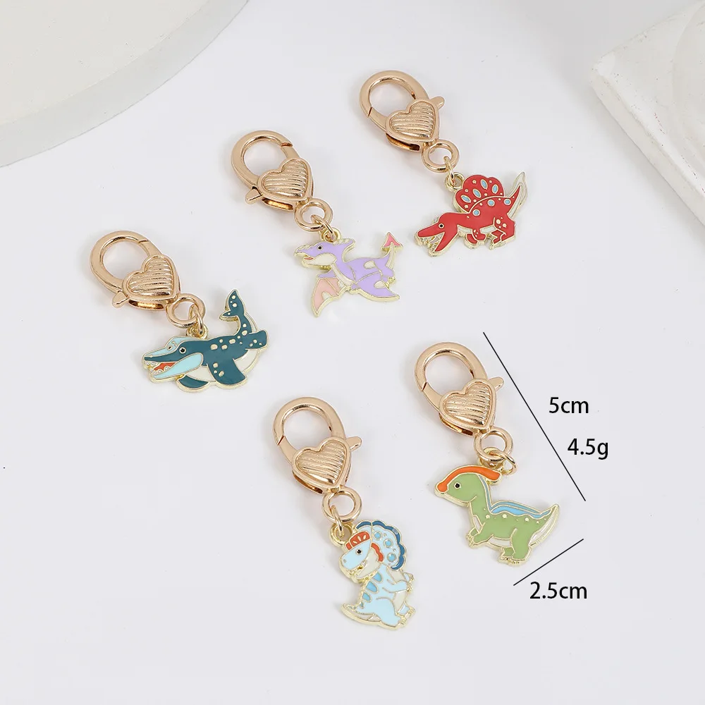 Newest dinosaurs design cute key chain custom your logo gold plating soft enamel metal keychain for bag