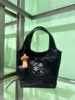 Piccolo piatto borsa blu-nera