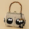Black coal ball bamboo knot bag