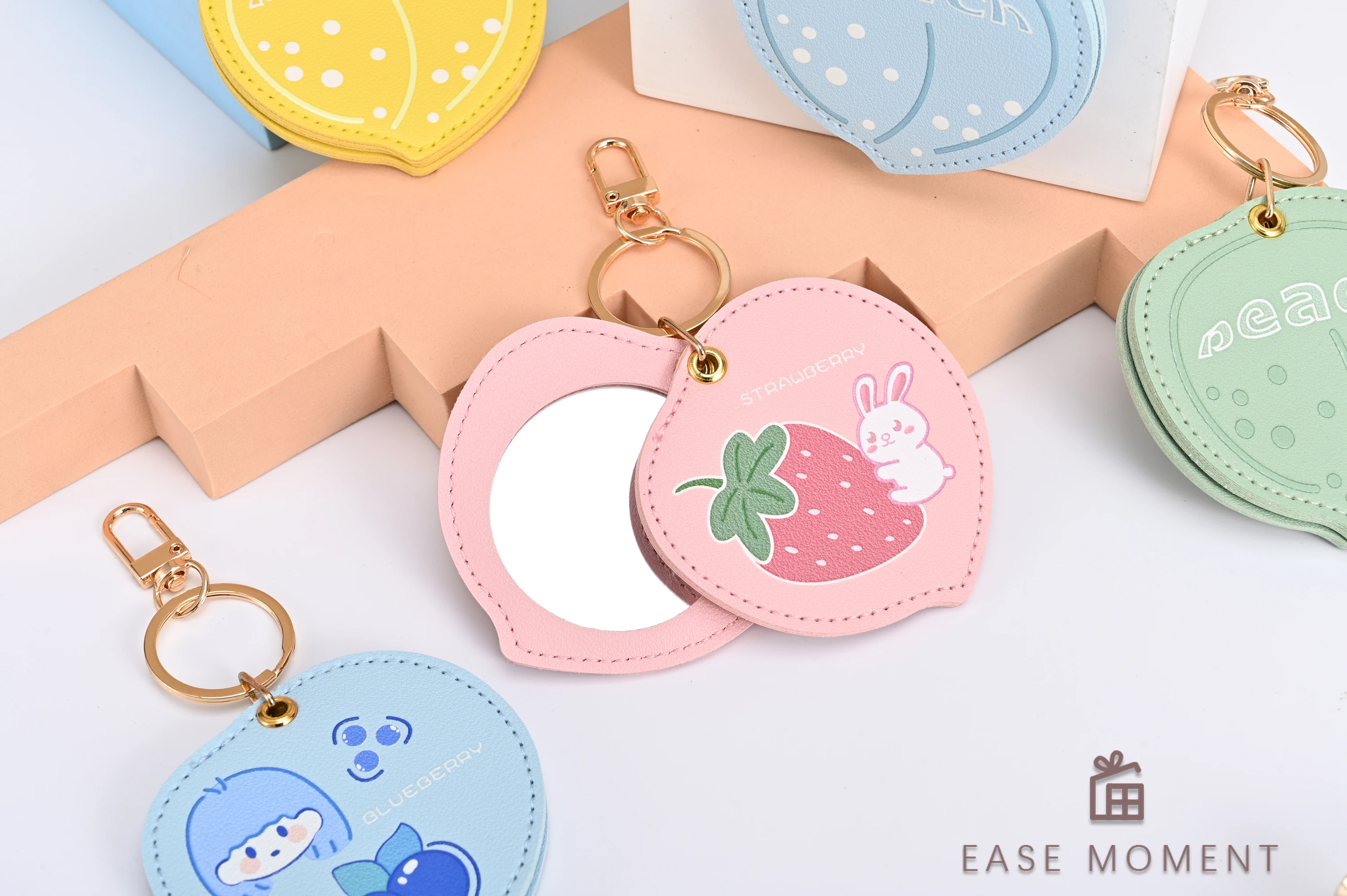 Newly Launched Gold Keychain Multi-color Leather case with Peach Shaped Cute Birthday Gift Hanging Bag and Makeup Mirror (1PC)