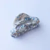 Confettis bleus et marron marbrés