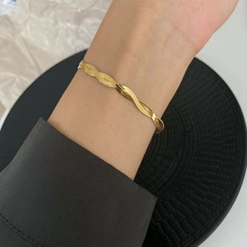 T000945929 XUPING JEWELRY Niche simple fashion light luxury gold braided stainless steel 24K gold-plated ins bracelet